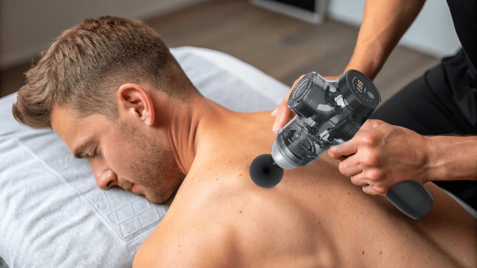 massage gun on muscle knots